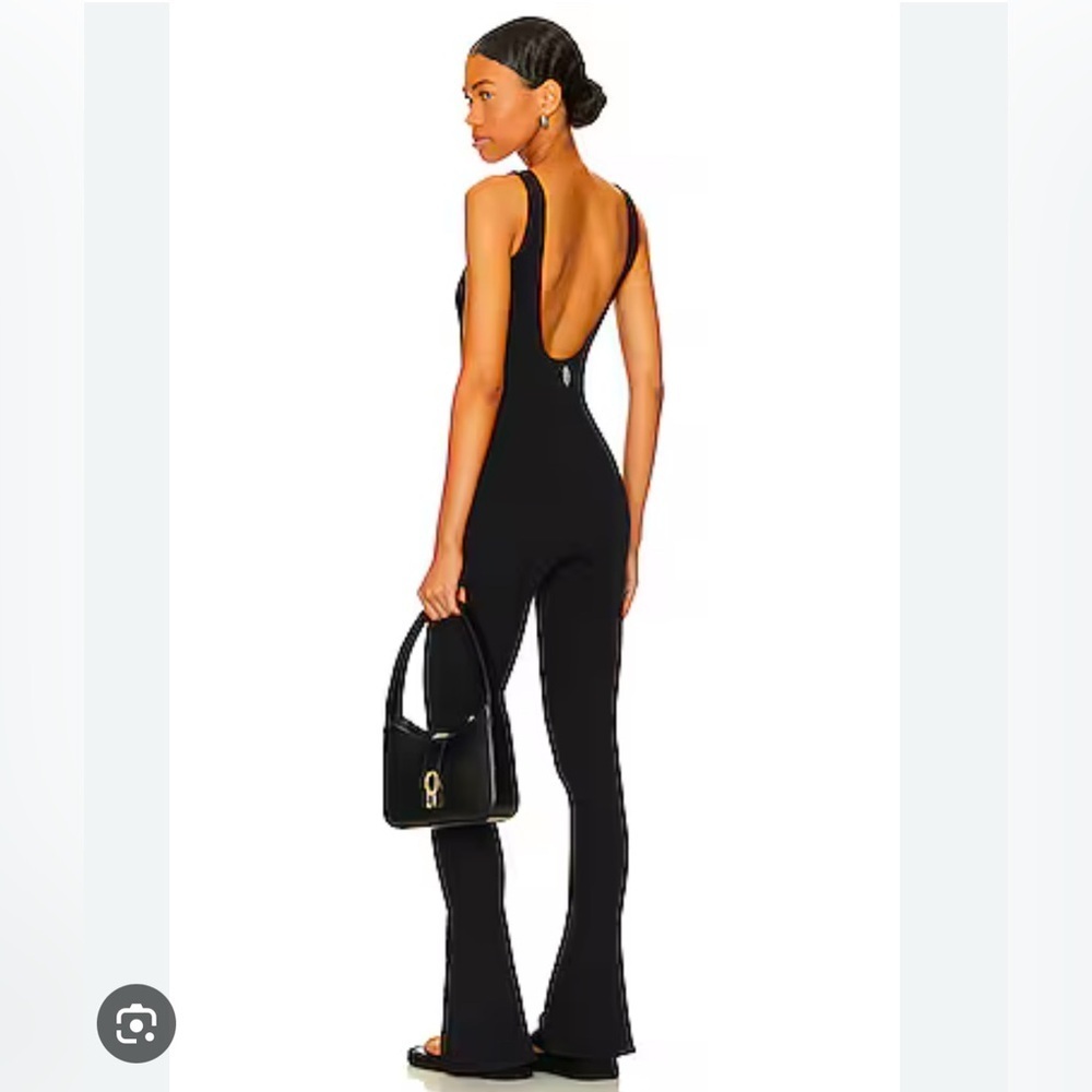 Free people movement rich soul black Onesie jumpsuit m/l
